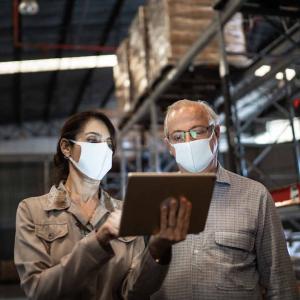 Two people in A Warehouse. Photo: iStock